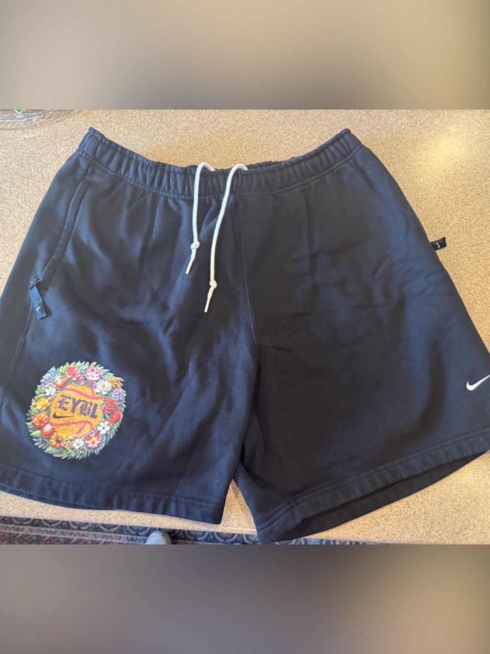 Nike EYBL Peach Jam Black Shorts with Colorful Floral Crest and White Drawstring